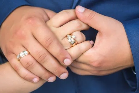 Holding hand with diamond ring Stock Photos