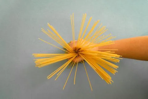 Holding hand spaghetti Stock Photos