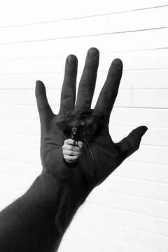 Holding up the hand to stop the robbery Stock-Fotos