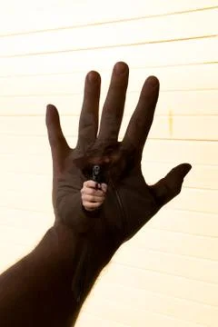 Holding up the hand to stop the robbery Stock-Fotos