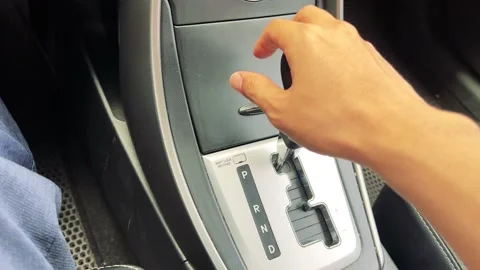 Holding the handle, changing the gear, stepping on the accelerator Stock Footage 197541646