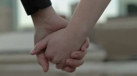 Holding Hands in the City Stock Footage 10772969
