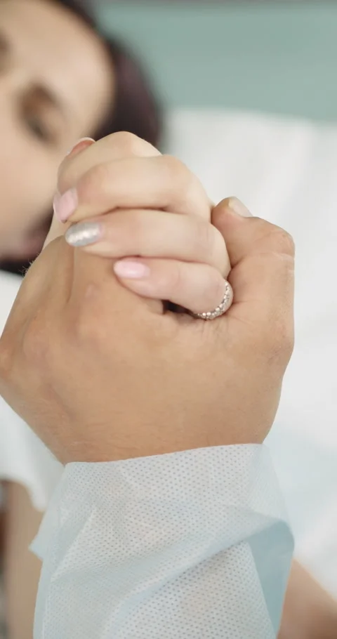 Holding Hands in Hospital Stock Footage 320092549