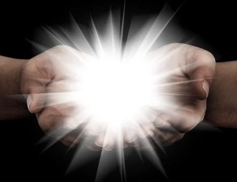 Holding hands open with glowing lights Stock Photos