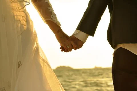 Holding hands Stock Photos