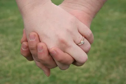 Holding hands Stock Photos