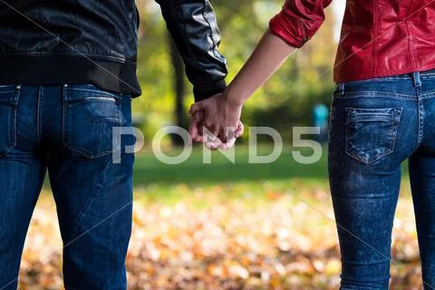 Holding hands Stock Photos