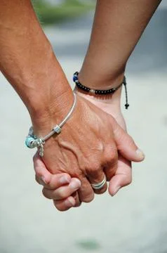 Holding hands Stock Photos