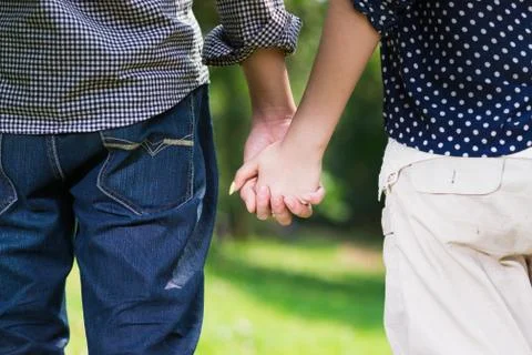 Holding hands Stock Photos