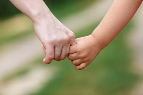 Holding hands Stock Photos