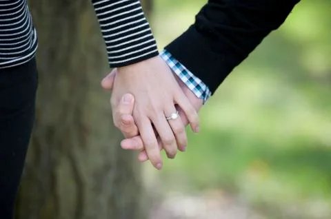 Holding Hands Stock Photos