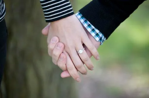 Holding Hands Stock Photos