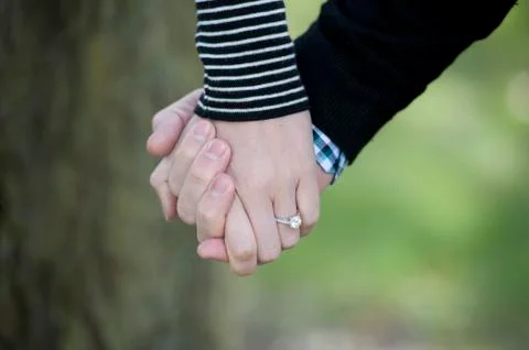 Holding Hands Stock Photos