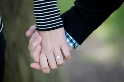 Holding Hands Stock Photos