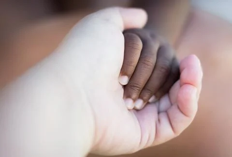 Holding hands Stock Photos