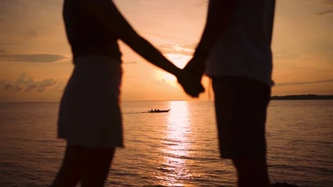 Holding Hands in the Sunset Graded Slow Motion Stock Footage 246771914
