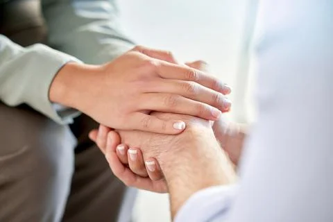 Holding hands, support and community hand gesture to show care, love and Stock Photos