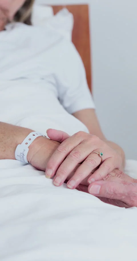 Holding hands, support and empathy with old couple in hospital for surgery Stock Footage 340892246