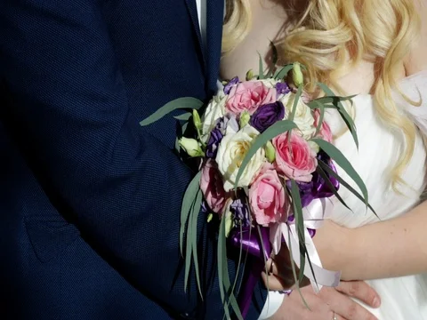 A holding hands together close up of just married couple Stock Footage 124960658