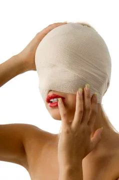 Holding head Stock Photos
