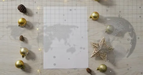 Holding holiday blank grid sheet, dotted map fading left globe emerging Stock Footage 317773205