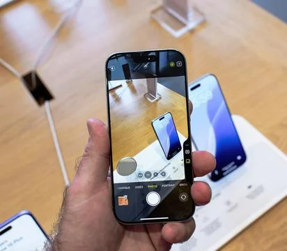 Holding iPhone 16 Pro Testing Camera Module Stock Photos