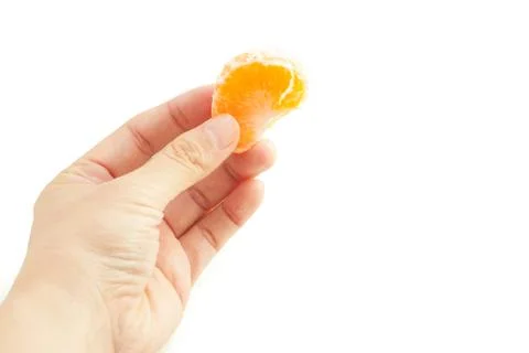 Holding Japanese mandarin orange by hand Stock Photos