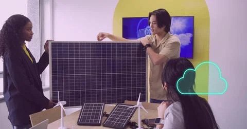 Holding large solar panel, colleagues testing tech in modern office, with solar Stock Photos