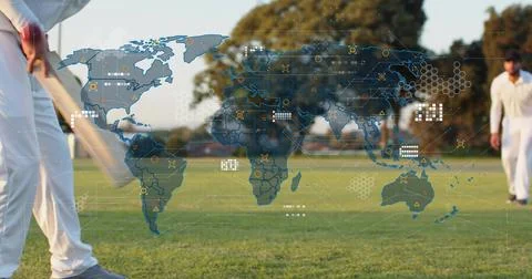 Holding left batsman in whites preparing shot at park, wooden bat, world map Stock Photos