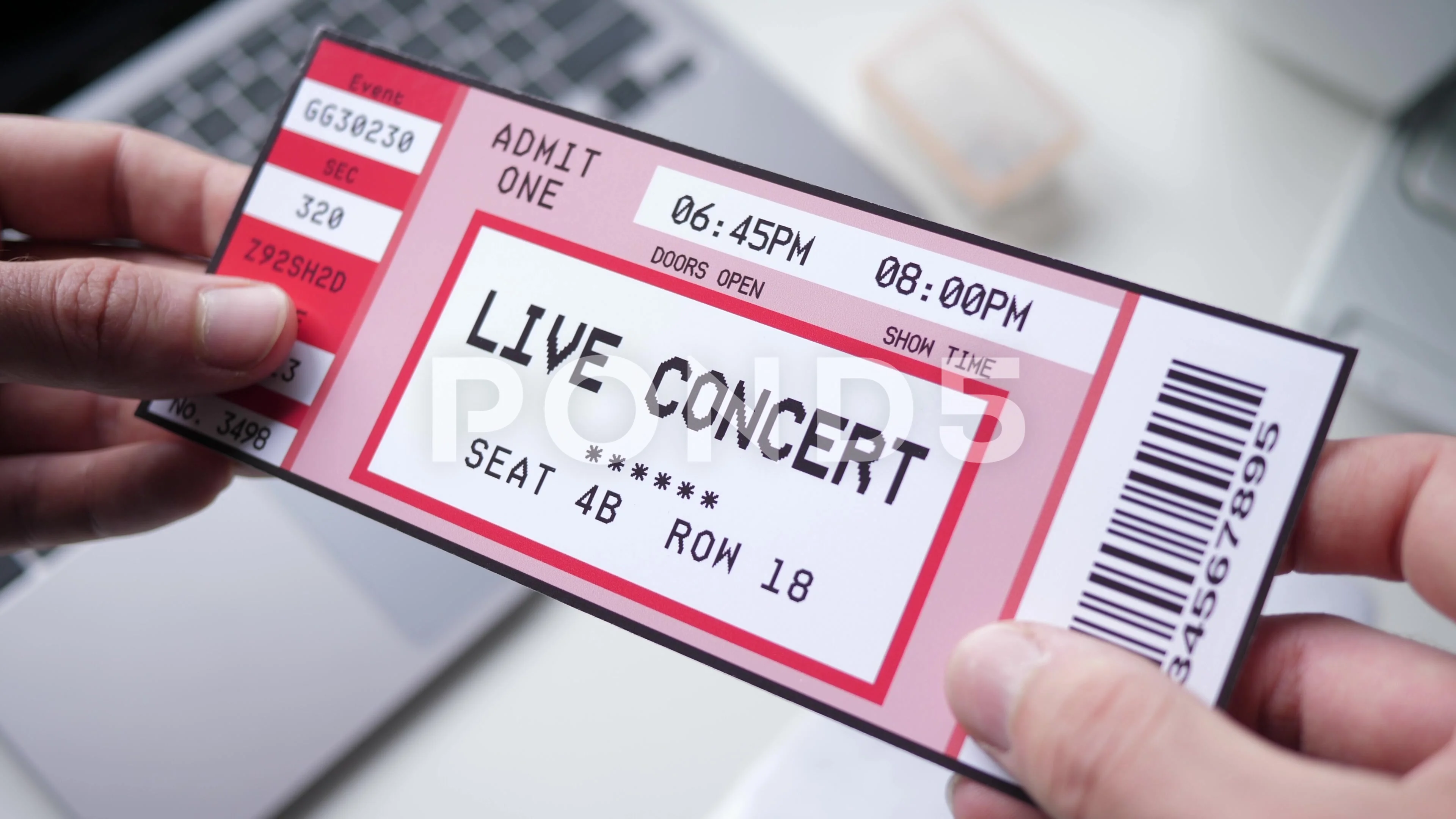 Holding a Live Music Concert Ticket in Hands Closeup