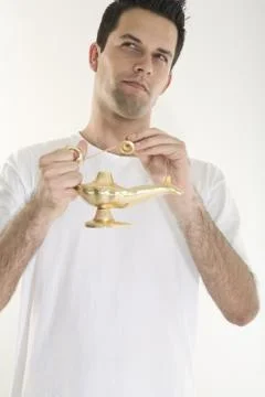 Holding a Magic Lamp Stock Photos