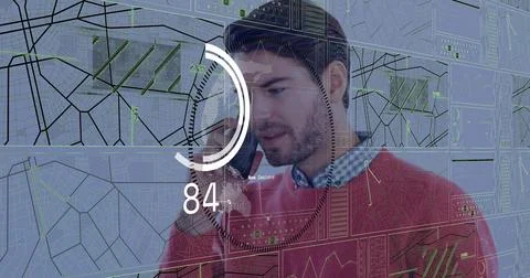 Holding man speaking on smartphone while consulting HUD with gauge 84 in tech Stock Photos