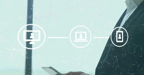Holding manager in dark suit checking phone near office window, sync icons, copy Stock Photos