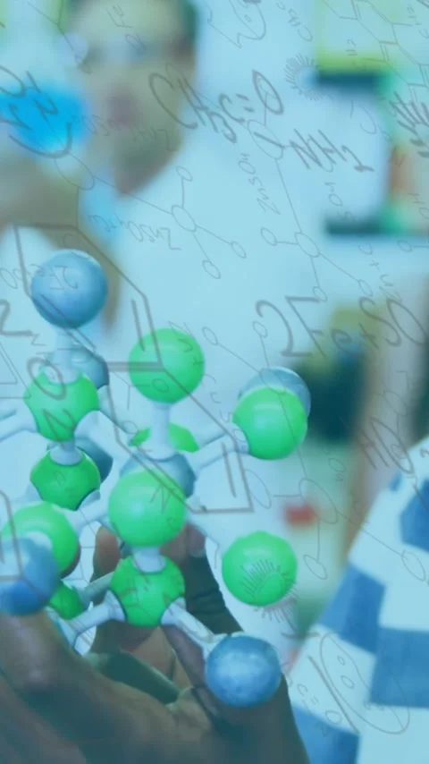 Holding molecular model, child studying science over mathematical equations Video stock 343682162