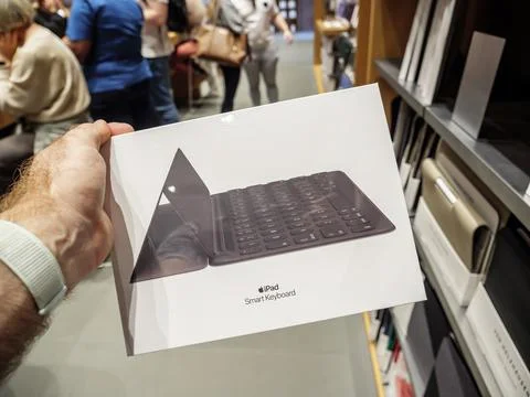 Holding new Apple Computers Smart Keyboard for iPad magnetic typing control Stock Photos