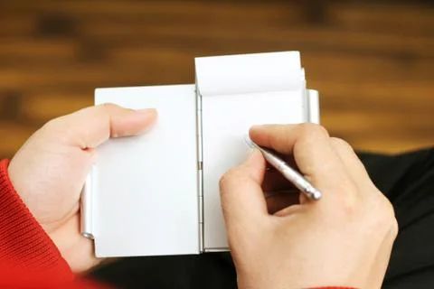 Holding Notebook in  hand. Stock Photos