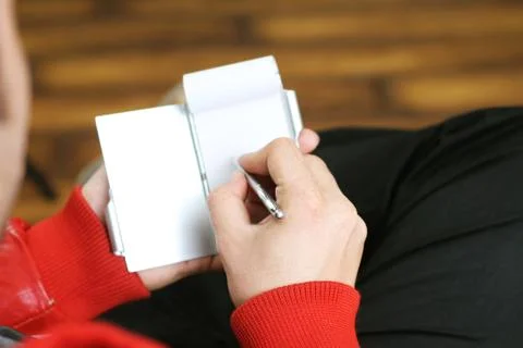 Holding Notebook in  hand. Stock Photos