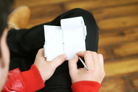Holding Notebook in  hand. Stock Photos