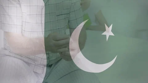 Holding object in hands, person with Pakistani flag overlay in animation Video stock 303441746