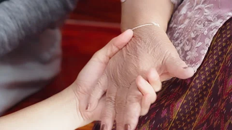 Holding old man Stock Footage 163676943