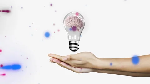 Holding out hand, brain inside lightbulb animation over white background with Stock Footage 303616793