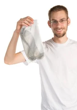 Holding pair of socks Stock Photos