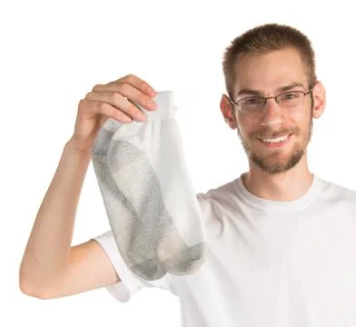 Holding pair of socks Stock Photos