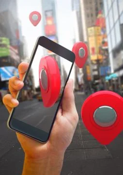 Holding phone and Location pointer markers in city street 写真素材