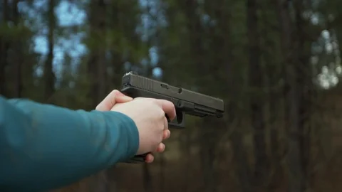 Holding Pistol Stock Footage 128069665