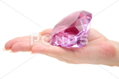 Holding a Precious Gem Isolated on a White Background Stock Photos