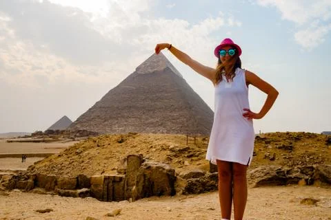Holding the pyramid in Cairo, Egypt Stock Photos