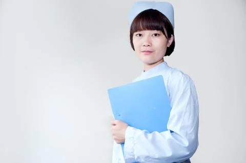 Holding the record of registered nurses Stock Photos