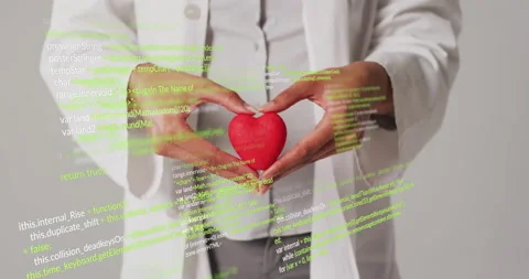 Holding red heart, doctor with code animation over medical concept Stock Footage 306432990