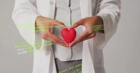 Holding red heart, doctor with code image over medical concept Illustrazione stock